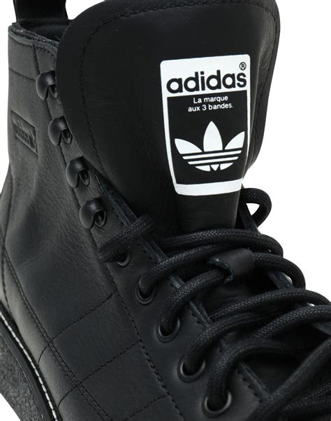 black high top adidas sneakers